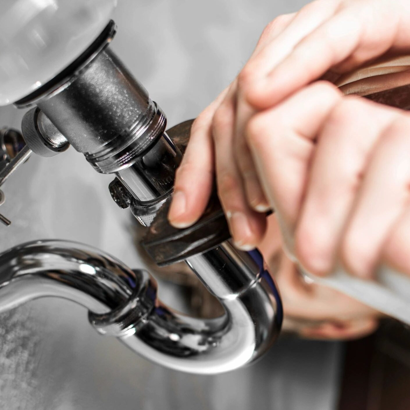 Alta licensed plumber servicing a residential plumbing system in the Chicago suburbs