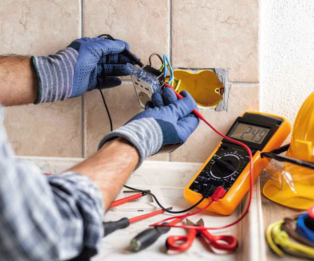Alta electrician performing a 200-amp electrical panel upgrade in a DuPage County home