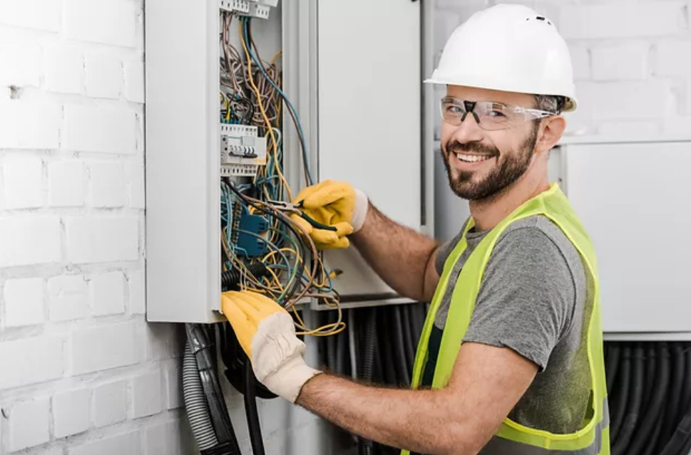 Close-up of a modern circuit breaker panel installed by Alta Property Services in DuPage County IL