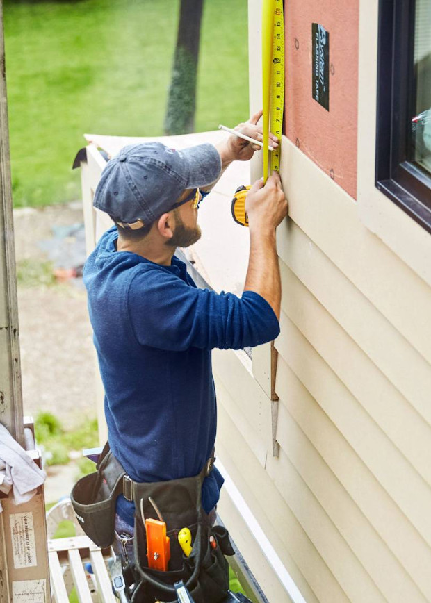 Alta Property Services crew completing siding repair on a Chicago-area home