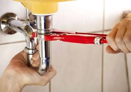 Alta Property Services technician performing emergency plumbing work in Glenview IL