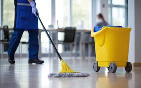 Alta janitorial specialist cleaning a commercial office building in Addison Illinois
