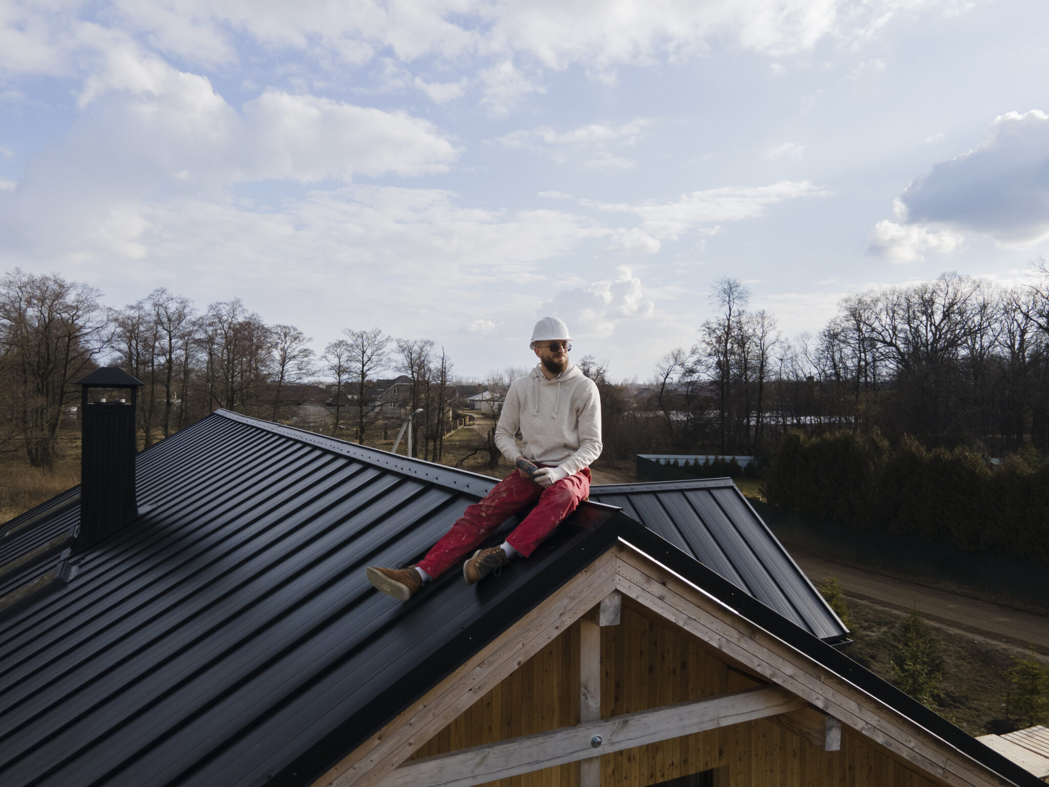 Alta Property Services licensed roofer inspecting a residential roof in Chicago suburbs Illinois