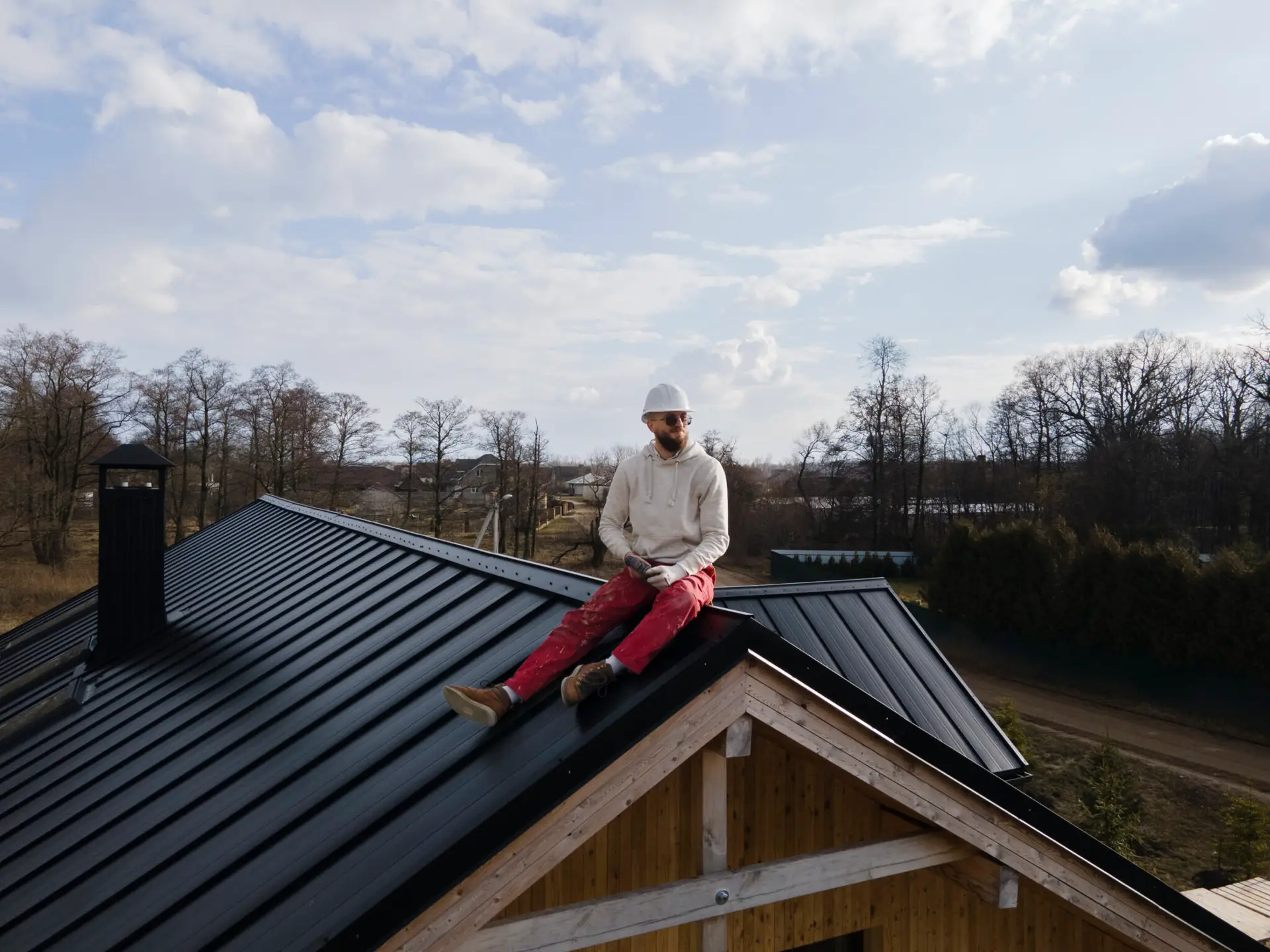 Alta Property Services licensed roofer inspecting a residential roof in the Chicago metro area
