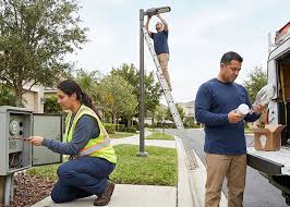 Alta Property Services technician performing HOA maintenance in Northbrook IL