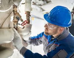 Alta emergency plumber responding to a burst pipe call in Skokie IL