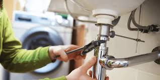 Alta plumber repairing a sewer line backup in a Skokie IL home