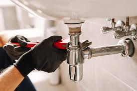 Alta licensed plumber repairing a burst pipe in a Wheeling IL property