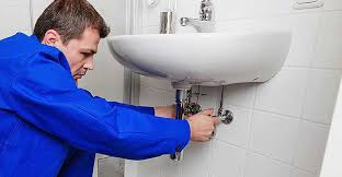 Alta emergency plumber arriving at a Woodridge IL property to repair a burst pipe
