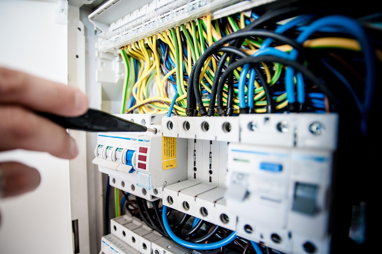 Licensed electrician performing electrical panel upgrade in Wheeling IL