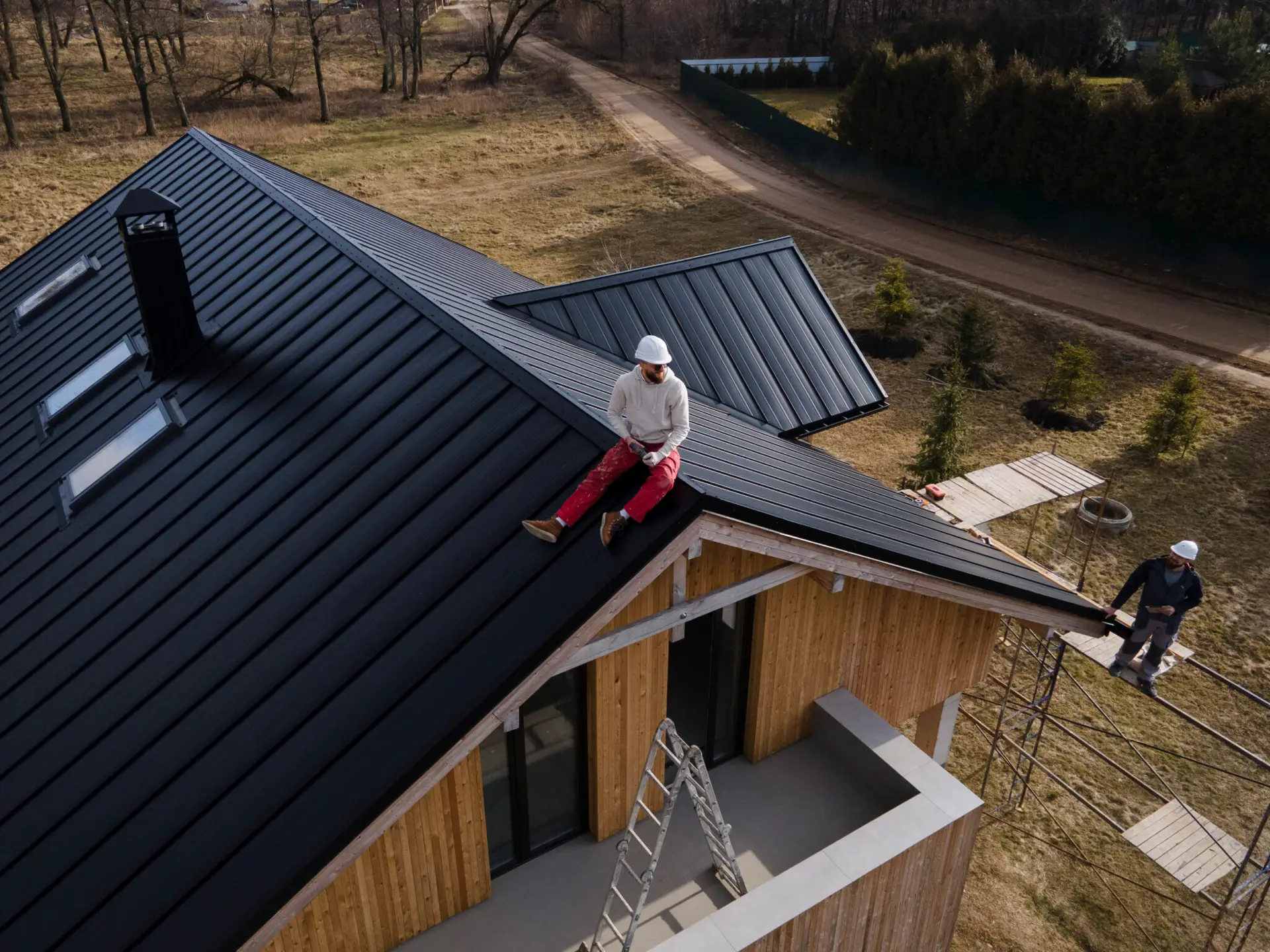 Alta Property Services technician performing roof repair and property restoration in McHenry County IL