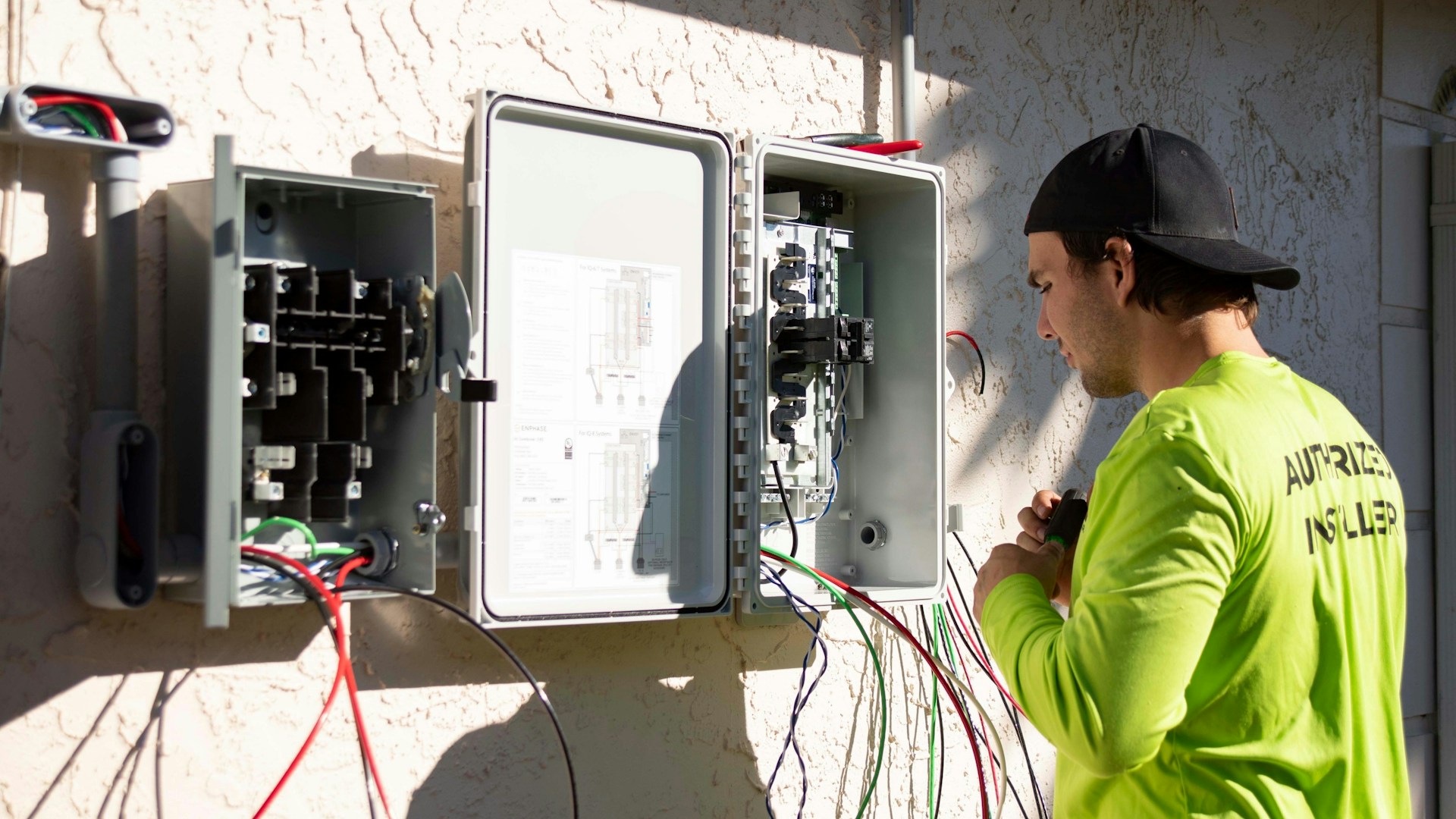 Alta Property Services licensed electrician working on an electrical panel upgrade in Evanston Illinois